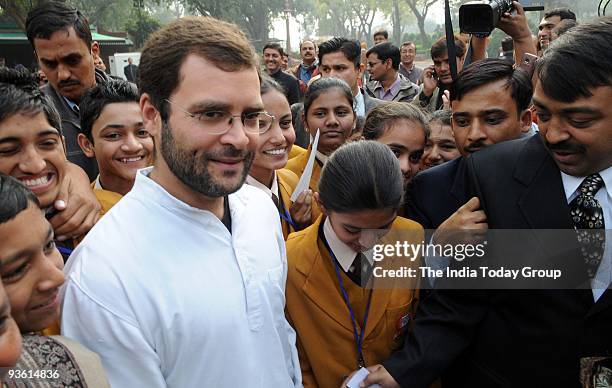 Congress General Secretary and Amethi MP Rahul Gandhi, meets students, who came to visit Parliament, in New Delhi on Tuesday.