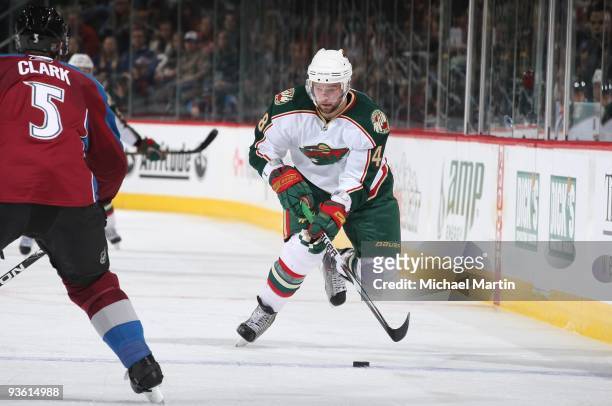 Guillaume Latendresse of the Minnesota Wild skates against the Colorado Avalanche at the Pepsi Center on November 28, 2009 in Denver, Colorado. The...