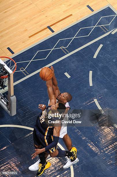 Danny Granger of the Indiana Pacers and Bobby Simmons of the New Jersey Nets go after a rebound during the game on November 17, 2009 at the Izod...