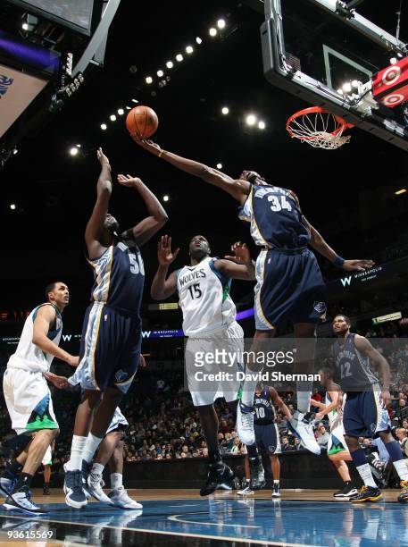 Hasheem Thabeet of the Memphis Grizzlies pulls down a rebound against Nathan Jawai of the Minnesota Timberwoves during the game on December 2, 2009...