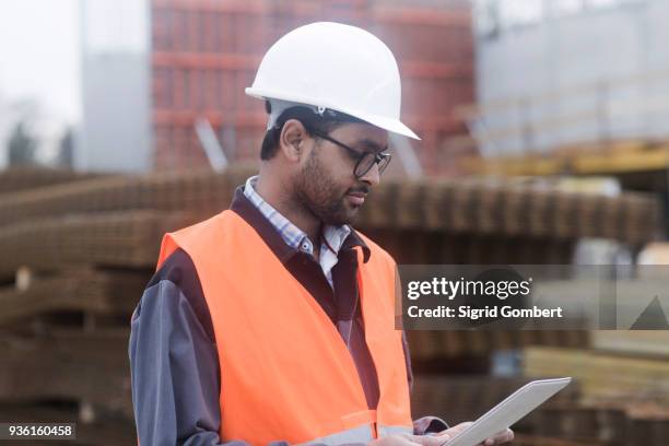 civil engineer working at site - sigrid gombert stock pictures, royalty-free photos & images