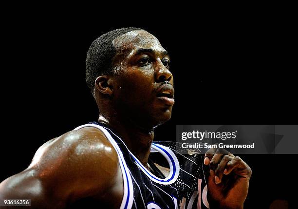 Dwight Howard of the Orlando Magic watches the action during the game against the New York Knicks at Amway Arena on December 2, 2009 in Orlando,...