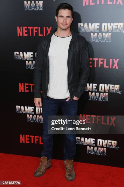 Actor Robbie Amell attends the Premiere Of Netflix's "Game Over, Man!" at Regency Village Theatre on March 21, 2018 in Westwood, California.