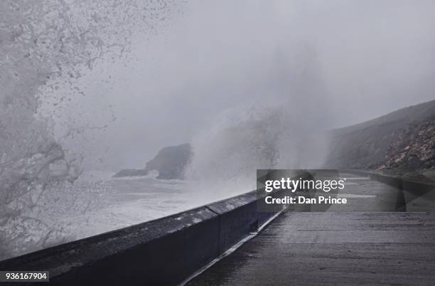 water crashing against sea wall, seaham harbour, durham, uk - retaining wall stock pictures, royalty-free photos & images