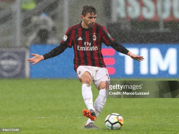 Fabio Borini of AC Milan kicks the ball during the serie A match between AC Milan and AC Chievo Verona at Stadio Giuseppe Meazza on March 18, 2018 in...