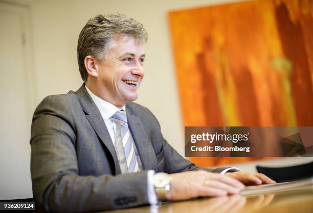 Klaus Bischof , real estate broker, reacts during an interview inside his office in Vienna, Austria, on Thursday, March 8, 2018. Investments in...