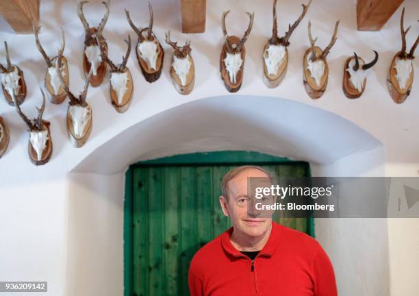 Heinrich Bubna-Litic, forest owner and hunter, poses for a photograph inside his hunting lodge near the village of Stanz im Muerztal in the province...