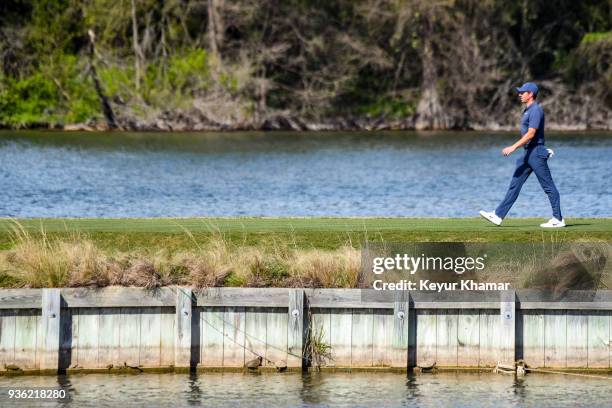 Rory McIlroy of Northern Ireland walks to the 14th hole tee box during round one of the World Golf Championships-Dell Technologies Match Play at...
