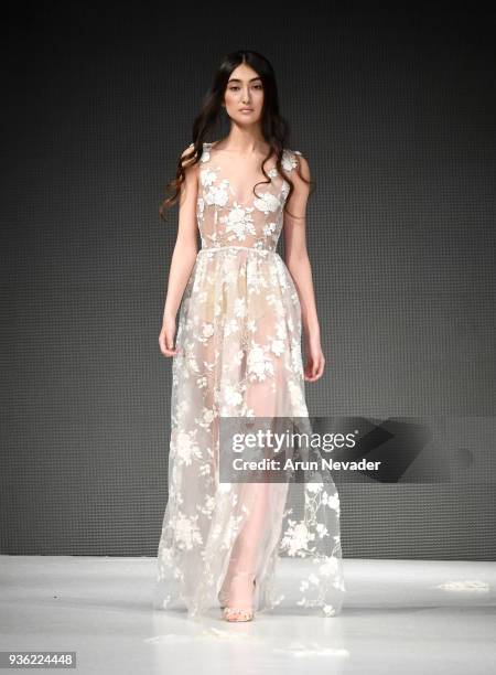 Model walks the runway wearing Allison Nicole at 2018 Vancouver Fashion Week - Day 2 on March 20, 2018 in Vancouver, Canada.