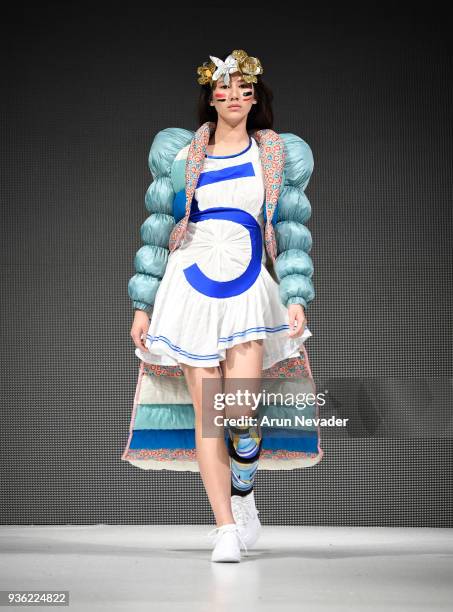 Model walks the runway wearing Emmanuelle Julliard at 2018 Vancouver Fashion Week - Day 2 on March 20, 2018 in Vancouver, Canada.