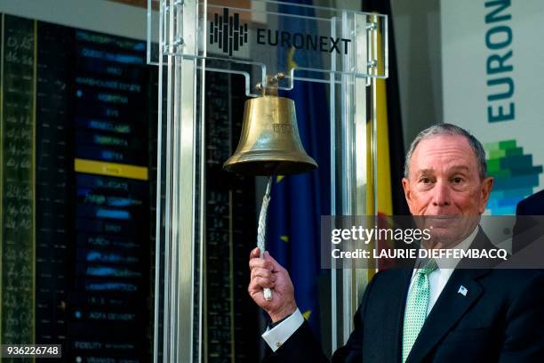 Task Force on Climate-related Financial Disclosures chairman, US billionaire Michael R. Bloomberg rings a bell at the opening ceremony of the NYSE...