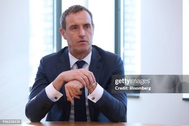 Rob Wainwright, executive director of Europol, speaks during an interview inside the European Union intelligence agency's headquarters in The Hague,...