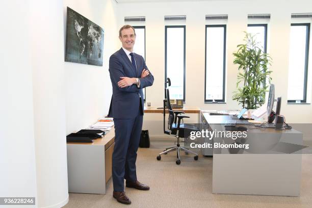 Rob Wainwright, executive director of Europol, poses for a photograph in his office inside the European Union intelligence agency's headquarters...