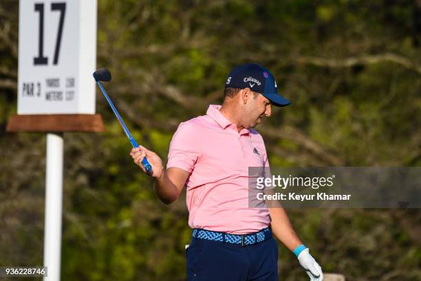 Sergio Garcia of Spain reacts to his tee shot on the 17th hole during round one of the World Golf Championships-Dell Technologies Match Play at...