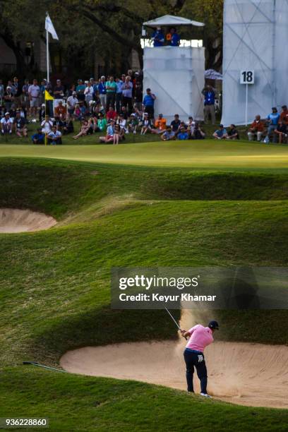 Sergio Garcia of Spain hits a shot out of a greenside bunker on the 18th hole during round one of the World Golf Championships-Dell Technologies...