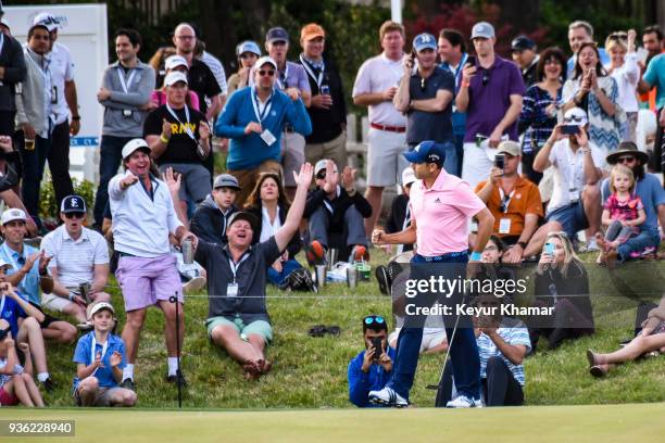 Sergio Garcia of Spain celebrates after making a 1-up winning putt on the 18th hole green during round one of the World Golf Championships-Dell...