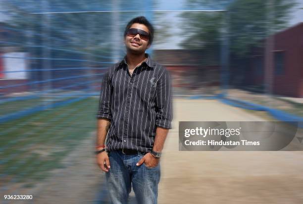 Virat Kohli, captain of Under -19 Cricket team, candidly poses for HT photographer during a visit to his school in New Delhi.