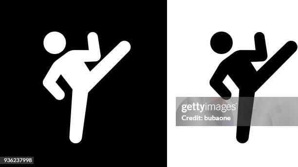 man kicking icon - martial arts stock illustrations