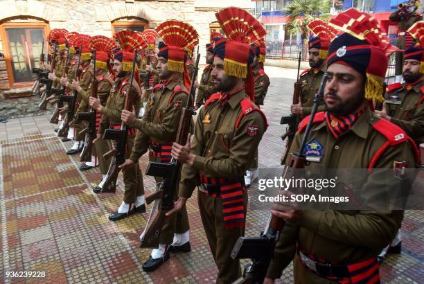 Jammu and Kashmir policemen pay homage of their dead colleague during a wreath laying ceremony in Srinagar. Five suspected militants and Five Indian...