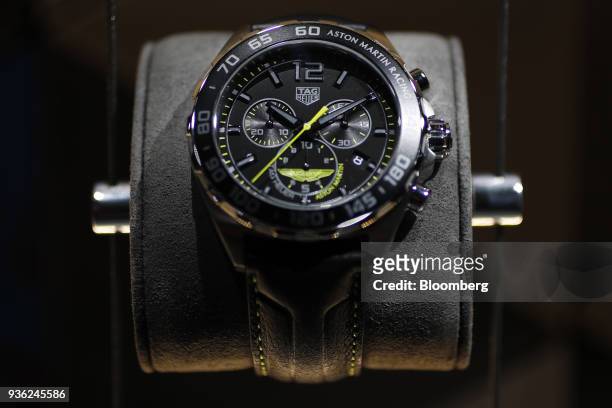 Special edition Aston Martin Racing Chronograph luxury wristwatch, produced by TAG Heuer International SA, stands on display during the opening day...