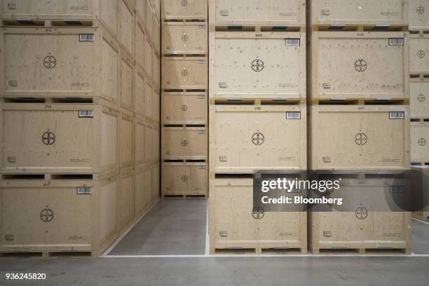 Crates of rapeseed stand stacked inside the Bayer CropScience AG processing facility in Monheim, Germany, on Wednesday, March 21, 2018. Bayer cleared...