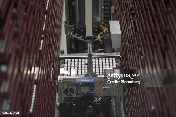 Tray containing vials of chemical research ingredients move through the substance library at the Bayer CropScience AG facility in Monheim, Germany,...