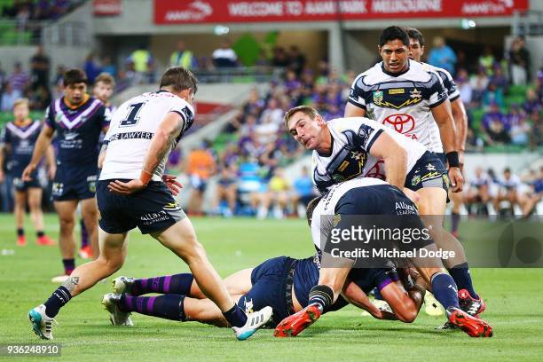 Nelson Asofa Solomona of the Storm scores a try during the round three NRL match between the Melbourne Storm and the North Queensland Cowboys at AAMI...