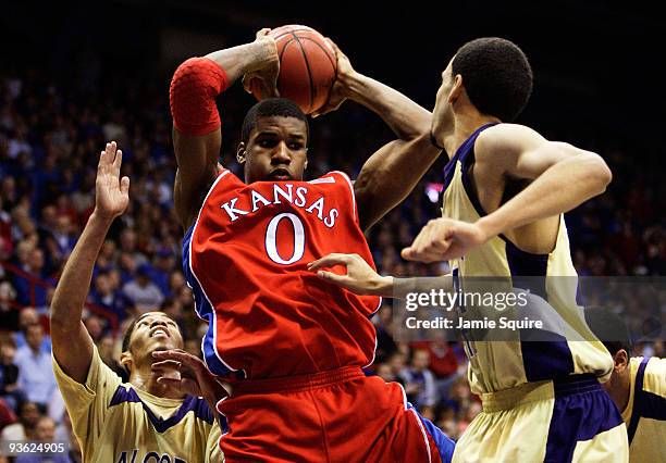 Thomas Robinson of the Kansas Jayhawks grabs a rebound during the game against the Alcorn State Braves on December 2, 2009 at Allen Fieldhouse in...