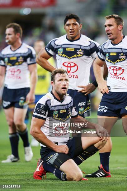 Cowboys players react after a try during the round three NRL match between the Melbourne Storm and the North Queensland Cowboys at AAMI Park on March...