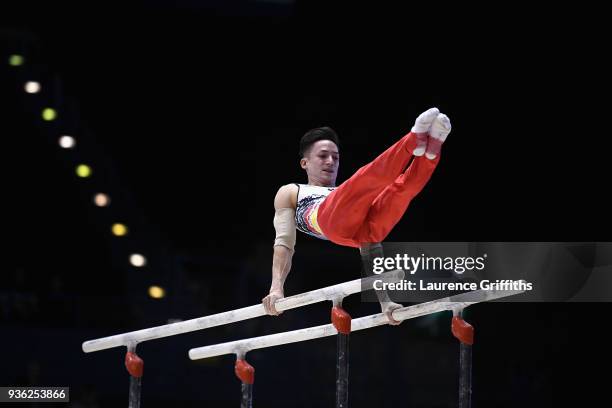 Marcel Nguyen of Germany competes on the parallel bars during day one of the 2018 Gymnastics World Cup at Arena Birmingham on March 21, 2018 in...