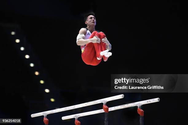 Marcel Nguyen of Germany competes on the parallel bars during day one of the 2018 Gymnastics World Cup at Arena Birmingham on March 21, 2018 in...
