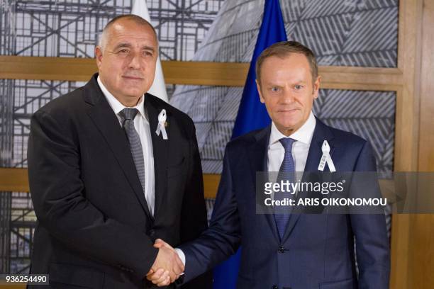 European Council President Donald Tusk shakes hands with Bulgarian Prime minister Boyko Borisov before a meeting at the European Council headquarters...
