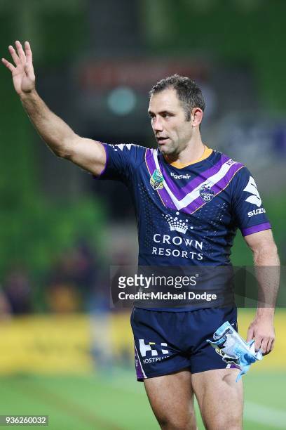 Cameron Smith of the Storm celebrates the win with fans during the round three NRL match between the Melbourne Storm and the North Queensland Cowboys...
