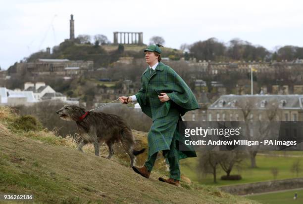 Harry Chamberlain with Lyra the bloodhound at the launch in Edinburgh of the Sherlock Holmes tartan which has been designed by the great great step...