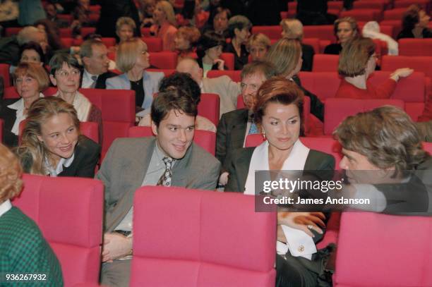 Paris - Bernard Tapie 's family attends a concert of french singer Jean-Jacques Debout. From left to right : Laurent Tapie with his wife on his...