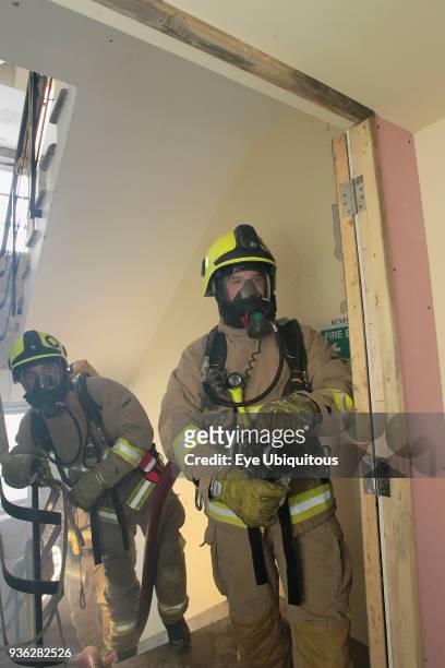 England, Kent, Sevenoaks, Fire and Rescue team on training exercise, breathing aparatus.