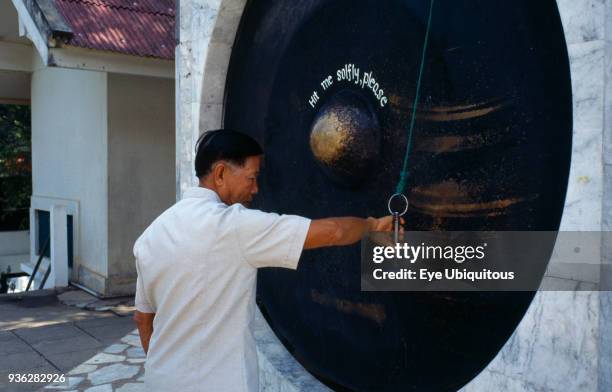 Man Ringing Gong 314 Thai Gong Stock Photos, High-Res Pictures, and Images - Getty Images