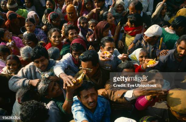 India, West Bengal, Sagar Island, Ganga Sagar, Crowd of pilgrims with offerings at temple to Sage Kapil Muni. Island is considered the point where...