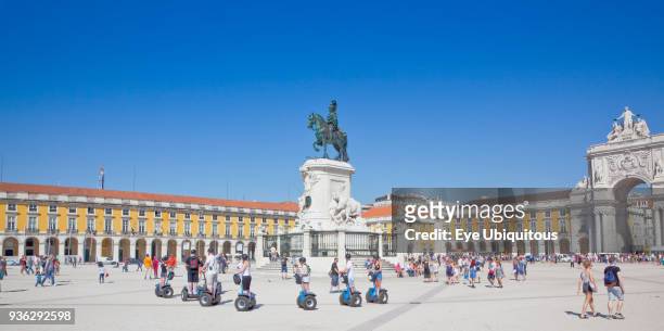 Portugal, Estremadura, Lisbon, Baixa, Praca do Comercio, Segway guided tour of the square with equestrian statue of King Jose and Rua Augusta...