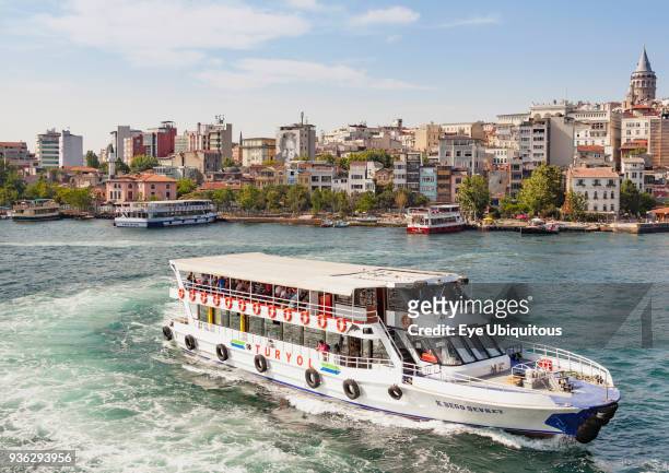 Turkey, Istanbul, Passenger ferry in the Golden Horn, and Galata Tower.