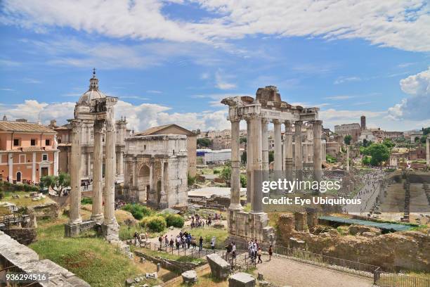 Italy, Rome, View of the Roman Forum from Capitoline Hill with ruins of the Arch of Septimus Severus and the Temple of Saturn prominent.