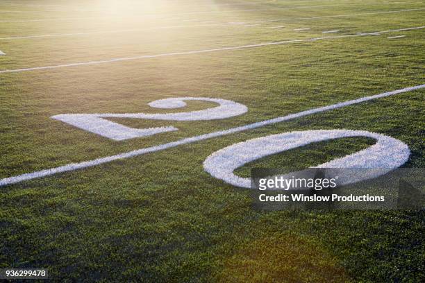 twenty yard line on green playing field - number 20 ストックフォトと画像