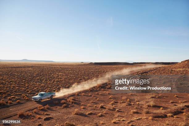 usa, arizona, pick up truck going through desert on route 66 - route 66 foto e immagini stock