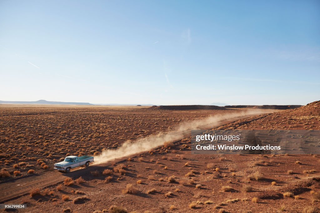 USA, Arizona, Pick up truck going through desert on Route 66