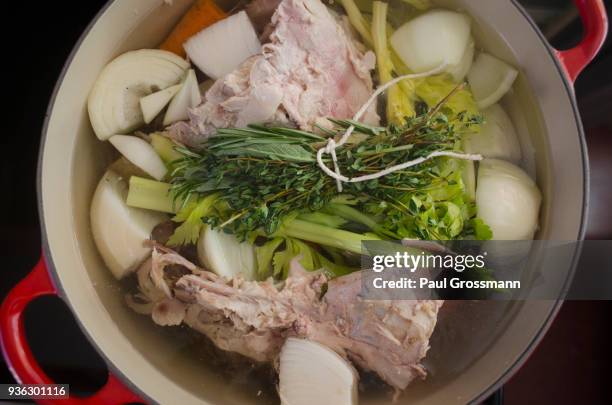 cooking broth from turkey leftovers and vegetables - bouquet garni stock pictures, royalty-free photos & images