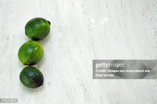 three lemons white background - cocktail recipe stock pictures, royalty-free photos & images