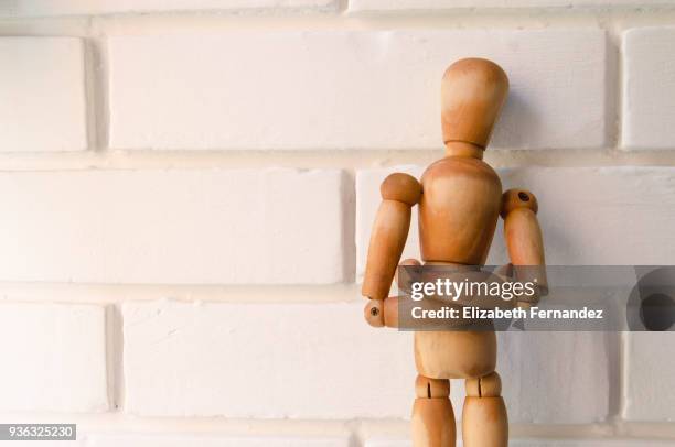 a satisfied dummy with arms crossed - mannequin arm stock pictures, royalty-free photos & images