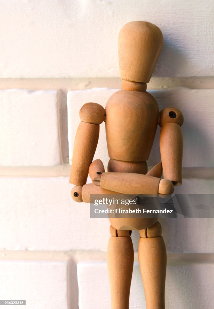 Wooden mannequin happy pose hi-res stock photography and images