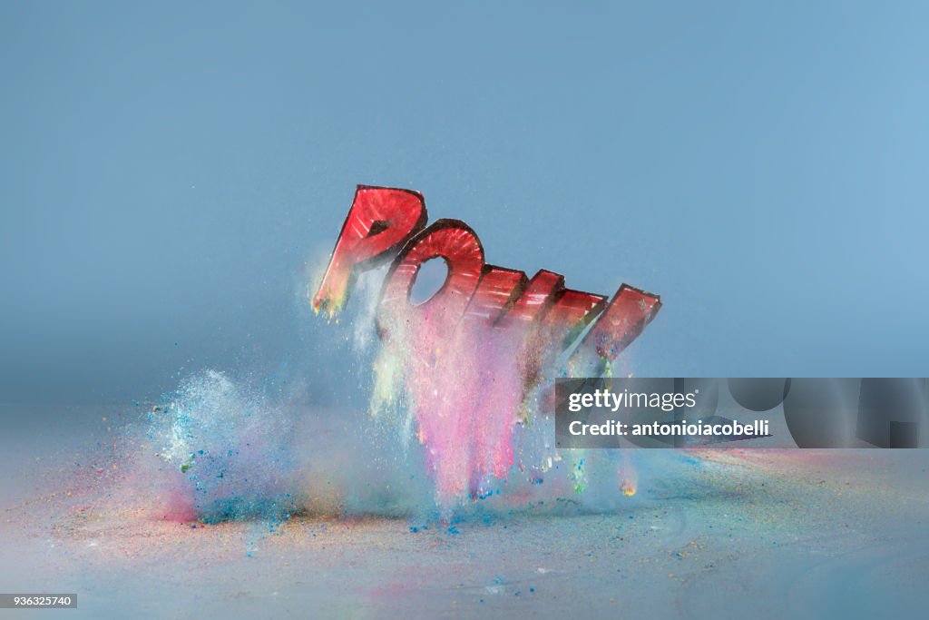 Acrylic paint explosion with the word Pow!