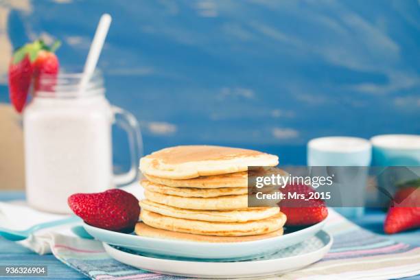 stack of pancakes with fresh strawberries - strawberry milkshake and nobody stock pictures, royalty-free photos & images